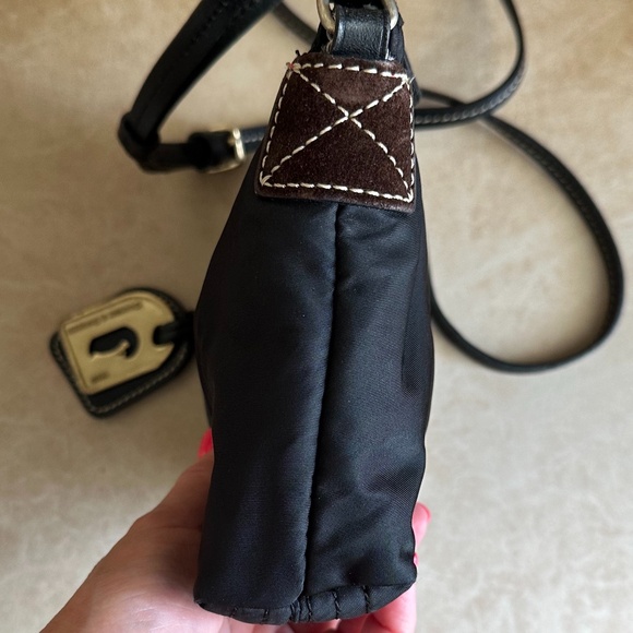 Dooney & Bourke Black Nylon Crossbody Bag with leather trim and pink interior - Picture 6 of 16